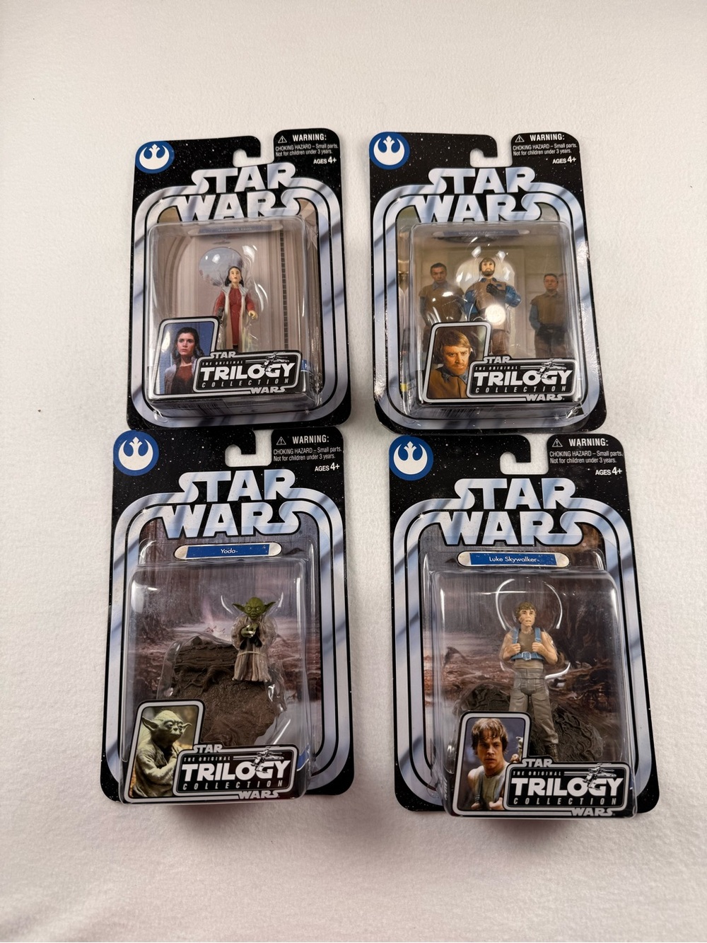 Star Wars Action Figures - Black, White, Blue Packaging (Set of 4)